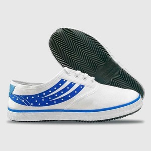 Green double couch with wooden legs