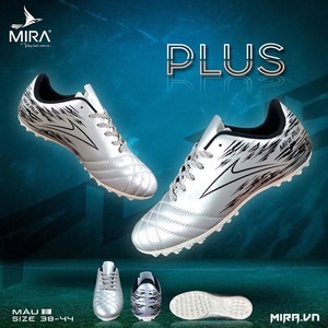 Green double couch with wooden legs