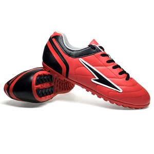 Green double couch with wooden legs