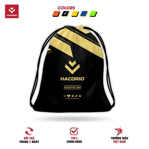 Green double couch with wooden legs