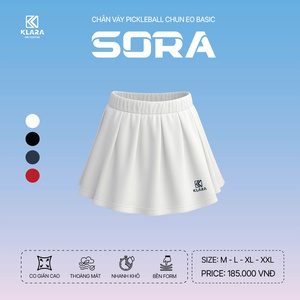 Green double couch with wooden legs