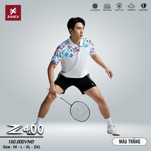 Green double couch with wooden legs