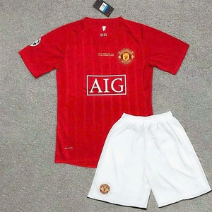 Green double couch with wooden legs