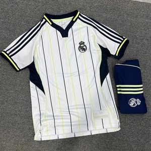 Green double couch with wooden legs