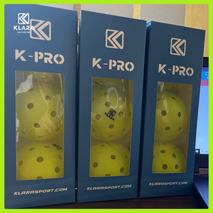 Green double couch with wooden legs