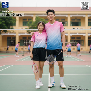 Green double couch with wooden legs