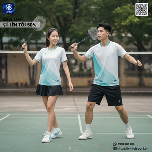 Green double couch with wooden legs