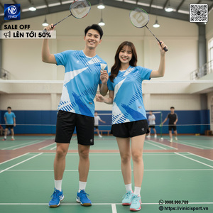 Green double couch with wooden legs