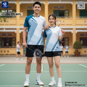 Green double couch with wooden legs