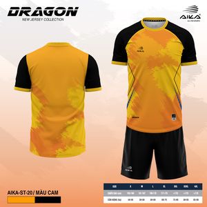 Green double couch with wooden legs