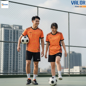 Green double couch with wooden legs