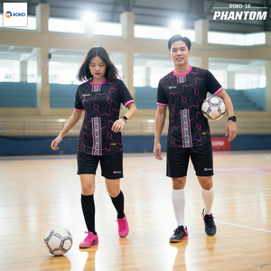 Green double couch with wooden legs