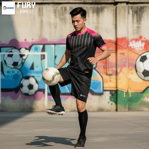 Green double couch with wooden legs