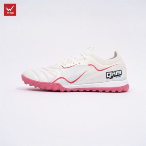 Green double couch with wooden legs