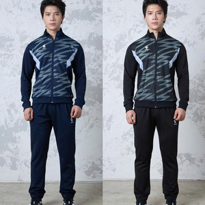 Green double couch with wooden legs