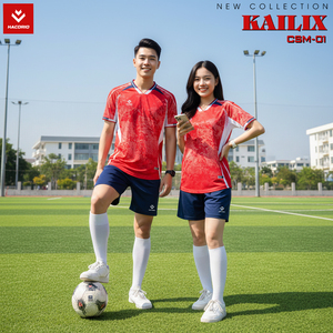 Green double couch with wooden legs